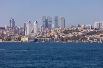 Fototapeta premium silhouette Istanbul city buildings from water Bosphorus or Golden Horn, public places.