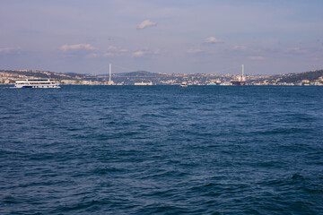 Fototapeta premium silhouette Istanbul city buildings from water Bosphorus or Golden Horn, public places.