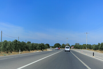 Highway wide road, transport and blue sky with clouds on a summer day