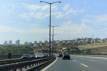 Highway wide road, transport and blue sky with clouds on a summer day