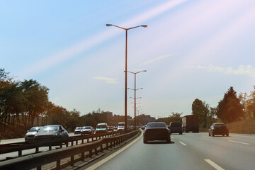 Highway wide road, transport and blue sky with clouds on a summer day