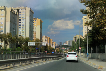 Highway wide road, transport and blue sky with clouds on a summer day