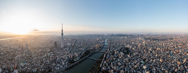 High altitude panoramic view over Tokyo city Japan in the morning. Asia urban cityscape panorama aerial view landmark capital city banner photo. - obrazy, fototapety, plakaty