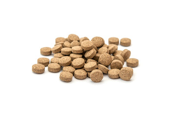 Pills on a white background. Medicines, medical capsules, dietary supplements, vitamins. Medicines close-up.