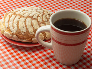 cup of coffee and pan de huevo