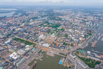 Fototapeta na wymiar Helsinki Downtown Cityscape, Finland. Cathedral Square, Market Square, Sky Wheel, Port, Harbor in Background. Drone Point of View