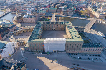Fototapeta premium Stockholm Old Town and Royal Palace in Background. It is located in Gamla Stan Island in Stockholm, Sweden. Drone Point of View