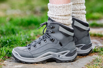 Man walking with elegant brand new hiking boots