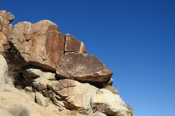 Ancient petroglyphs found on boulders located within Grapevine Canyon, in the Newberry Mountain Wilderness, Mojave Desert, Nevada.