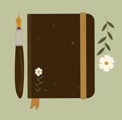 Dark color notepad with ink pen and flowers