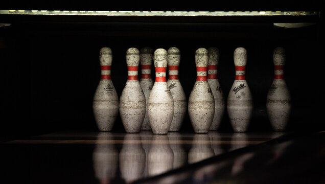Warsaw, Poland - February 8, 2022: Bowling on the lane in a bowling alley. Bowling in a close-up at the end of the lane.