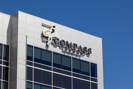  
Mississauga, ON, Canada - May 14, 2022: Compass Group&rsquo;s sign  on the building. Compass Group plc is a British multinational contract foodservice company.
