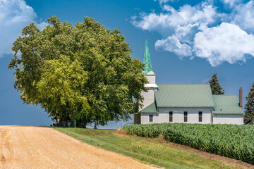 White Church Along Gravel Road in American Midwest - 532843525