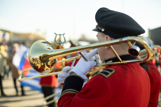 Trumpeter of military band. Wind instrument. Music performance.