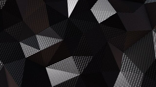 Realistic abstract looping 3D animation of the moving carbon fiber polygonal surface rendered in UHD as motion background