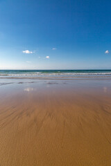 Perranporth beach in Cornwall on a sunny day