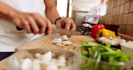 Chef hands, knife and vegetables on chopping board cooking healthy, nutrition and diet brunch food in house kitchen. Fast, chop and young man prepare organic, vegan or vegetarian dinner salad in home