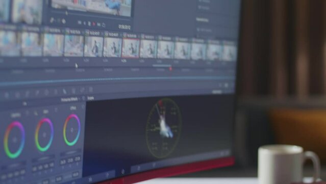 Close Up Of A Desktop Being Used By Man'S Hands For Editing And Color Grading The Video By A Desktop At Home
