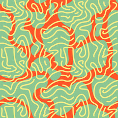 pattern of green spots on an orange background with yellow lines