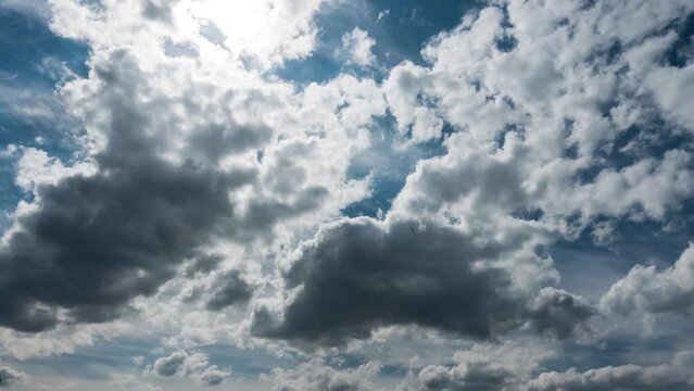 Timelapse of Puffy Clouds Moving in the Blue Sky Cloud Space