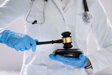 Medical Doctor Malpractice And Attorney Gavel