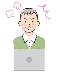 パソコン操作で怒るシニア男性