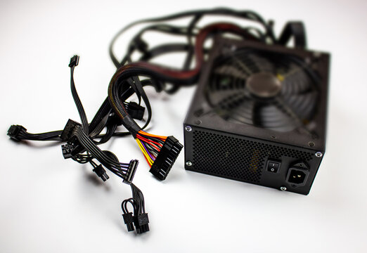 PC power supply. Black power supply with wires from the PC.