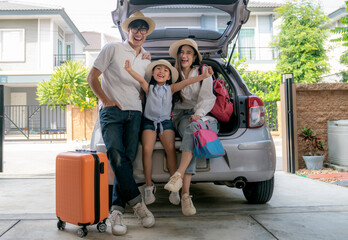 Asian family ready to start travel by they SUV car from they home - 532872386