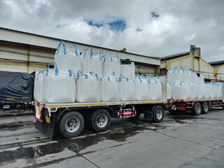 Trailer loading goods fertilizer urea sack jumbo to customers