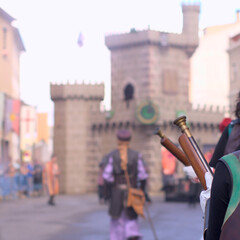 Moors holding blunderbuss weapons in front of castle. Moros y cristianos traditional fest in Ibi, Alicante. High quality photo