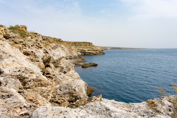 Cape Tarkhankut. Natural landmark of Crimea. Rocks and sea. Rocky coast of Crimea. Tourism, vacation in nature.