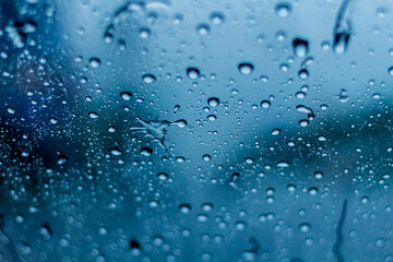 a window with water drops on the glass window after the rain.