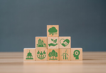 Zero net emissions renewable energy sustainable technology ecological environment CO2 emission icon in ESG concept. Green CO2 emission concept on a wooden block in the green industry business .