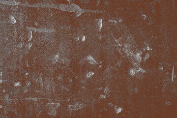Distressed old concrete wall with scratches and spots