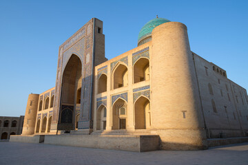 Fototapeta na wymiar Medieval Miri-Arab madrasah on a sunny morning. Bukhara. Uzbekistan