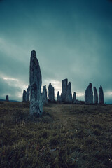 Ancient magic in the Calanais Standing Stones Circle, erected by neolithic men for worship. Celtic traditions in the outer hebrides of Scotland. Touristic attraction.