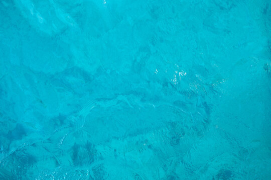 Defocused blue and green color of the sea water.Blurred water background concept.