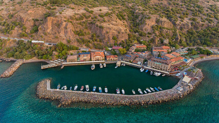 Aerial view of a fishing boats at small harbor of Assos City in Balıkesir, Turkey.  Small fishing...