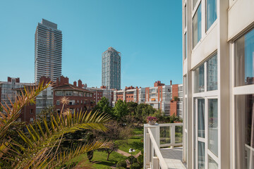Fototapeta na wymiar View from a balcony in modern residential complex in Barcelona, Spain
