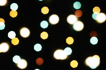 multicolored festive lights on a black background screensaver backdrop
