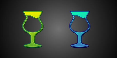 Green and blue Glass of beer icon isolated on black background. Vector