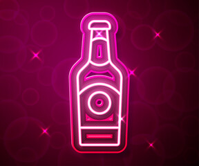 Glowing neon line Beer bottle icon isolated on red background. Vector