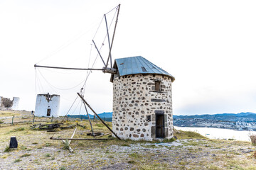 Fototapeta na wymiar An old stone windmill in Bodrum, Turkey