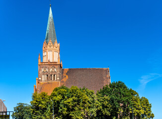 Historic Holy Mary gothic Kosciol Mariacki church in old town quarter of Trzebiatow in Poland