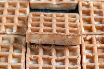soft sweet waffles on the table, close up