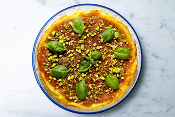 Manchego cheesecake with quince jam and pistachio. Spanish cheesecake recipe.