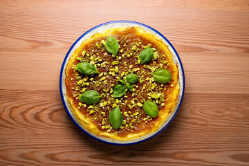 Manchego cheesecake with quince jam and pistachio. Spanish cheesecake recipe.