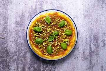 Manchego cheesecake with quince jam and pistachio. Spanish cheesecake recipe.