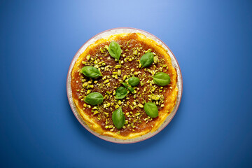 Manchego cheesecake with quince jam and pistachio. Spanish cheesecake recipe.