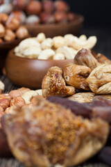 Dried figs on a black wooden table